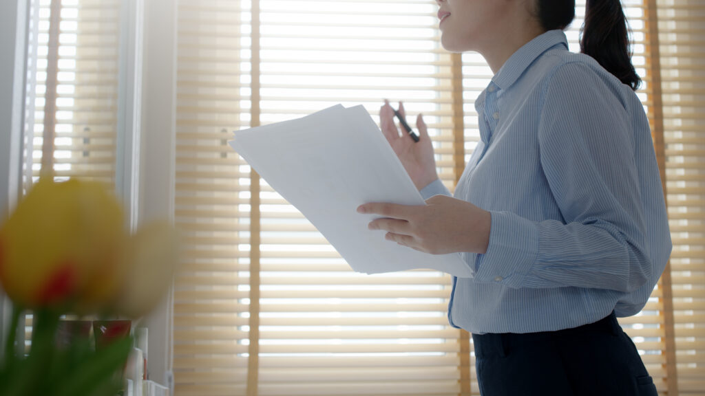 young woman practicing sales pitch